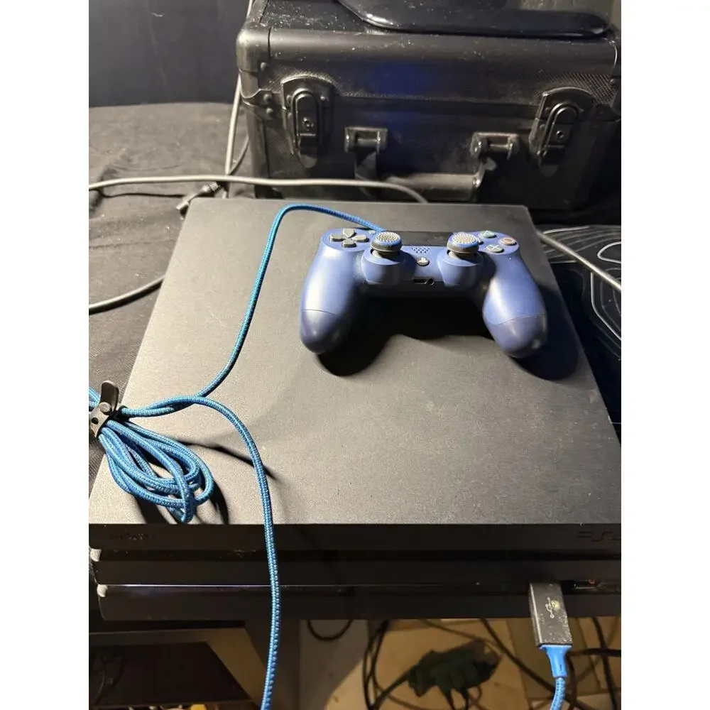 PlayStation 4 Pro Model CUH-7215B 1 TB controller And Game